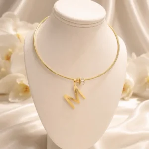 olive jewelry omega necklace with initial